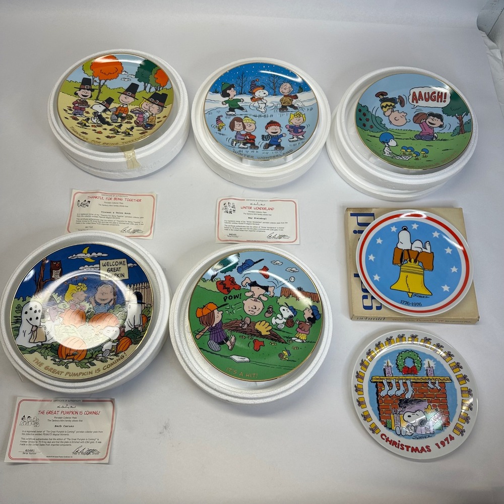 7 Peanuts Collector Plates Danbury Mint  3 papers Schmid Christmas Bicentennial